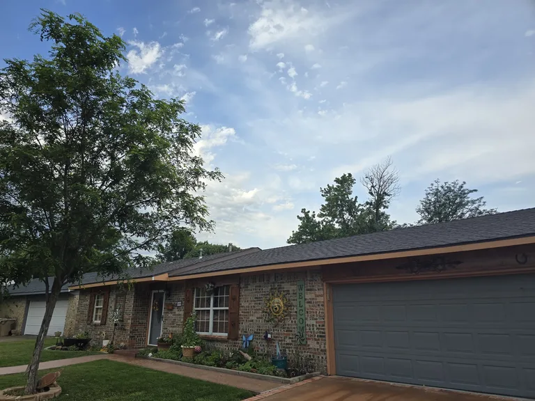 Completed residential home in Borger, Texas with a brand-new shingle roof from 5 Star Roofing